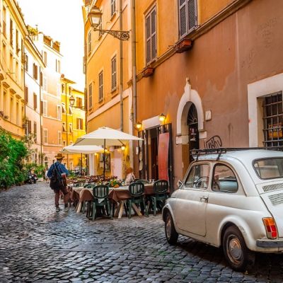 Cozy street in Trastevere, Rome, Europe. Trastevere is a romantic district of Rome, along the Tiber in Rome. Turistic attraction of Rome.